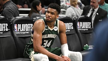 Apr 26, 2023; Milwaukee, Wisconsin, USA; Milwaukee Bucks forward Giannis Antetokounmpo (34) sits on the bench after a 128-126 loss to the Miami Heat during game five of the 2023 NBA Playoffs at Fiserv Forum. Mandatory Credit: Michael McLoone-Imagn Images