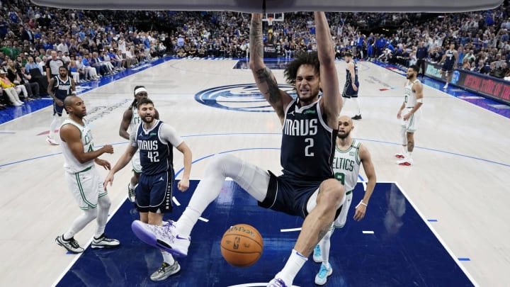 Jun 14, 2024; Dallas, Texas, USA; Dallas Mavericks center Dereck Lively II (2) dunks the ball against the Boston Celtics during game four of the 2024 NBA Finals at American Airlines Center. Mandatory Credit: Stacy Revere/Pool Photo-USA TODAY Sports