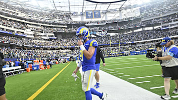 Oct 6, 2024; Inglewood, California, USA; Los Angeles Rams quarterback Matthew Stafford (9) walks off the field after losing to the Green Bay Packers at SoFi Stadium. Mandatory Credit: Robert Hanashiro-Imagn Images