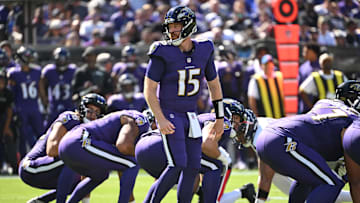 Oct 5, 2025; Baltimore, Maryland, USA; Baltimore Ravens quarterback Cooper Rush (15) directs a play during the first quarter against the Houston Texans at M&T Bank Stadium. Mandatory Credit: Rafael Suanes-Imagn Images