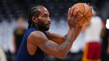 Apr 29, 2025; Denver, Colorado, USA; LA Clippers forward Kawhi Leonard (2) warms up before game five of the first round for the 2025 NBA Playoffs against the Denver Nuggets at Ball Arena.