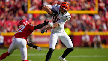 Cincinnati Bengals tight end Mike Gesicki (88) breaks a tackle attempt from Kansas City Chiefs safety Chamarri Conner (27) on a catch in the second quarter of the NFL Week 2 game between the Kansas City Chiefs and the Cincinnati Bengals at Arrowhead Stadium in Kansas City on Sunday, Sept. 15, 2024. The Bengals led 16-10 at halftime.