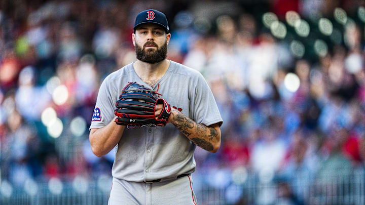 Boston Red Sox starting pitcher Lucas Giolito prepares to throw a pitch versus the Atlanta Braves in 2025.