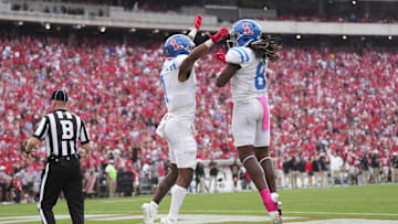 Oct 18, 2025; Athens, Georgia, USA;  Mississippi Rebels wide receiver De'Zhaun Stribling (1) celebrates his touchdown against the Georgia Bulldogs with tight end Dae'Quan Wright (8) during the second half of the game at Sanford Stadium. Mandatory Credit: Dale Zanine-Imagn Images