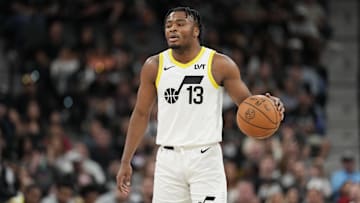 Nov 9, 2024; San Antonio, Texas, USA;  Utah Jazz guard Isaiah Collier (13) controls the ball in the first half against the San Antonio Spurs at Frost Bank Center. Mandatory Credit: Daniel Dunn-Imagn Images