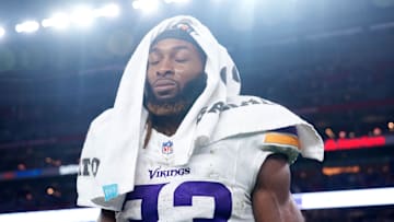 Jan 13, 2025; Glendale, AZ, USA; Minnesota Vikings running back Aaron Jones (33) reacts after the NFC wild card game against the Los Angeles Rams at State Farm Stadium. Mandatory Credit: Joe Camporeale-Imagn Images