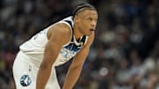 Mar 9, 2025; Minneapolis, Minnesota, USA; Minnesota Timberwolves guard Jaylen Clark (22) looks on during a free throw against the San Antonio Spurs in the first half at Target Center. Mandatory Credit: Jesse Johnson-Imagn Images