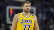 Apr 25, 2025; Minneapolis, Minnesota, USA; Los Angeles Lakers guard Luka Doncic (77) looks on against the Minnesota Timberwolves in the first half during game three of first round for the 2024 NBA Playoffs at Target Center. Mandatory Credit: Jesse Johnson-Imagn Images