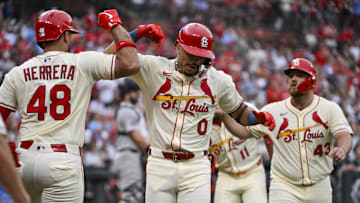 Aug 16, 2025; St. Louis, Missouri, USA;  St. Louis Cardinals shortstop Masyn Winn (0) celebrates with designated hitter Ivan Herrera (48) after hitting a three run home run against the New York Yankees during the second inning at Busch Stadium. Mandatory Credit: Jeff Curry-Imagn Images