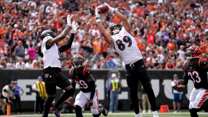 Baltimore Ravens tight end Mark Andrews (89) collects a pass in the end zone as Cincinnati Bengals cornerback Cam Taylor-Britt (29) defends in the second quarter of a Week 2 NFL football game between the Baltimore Ravens and the Cincinnati Bengals Sunday, 