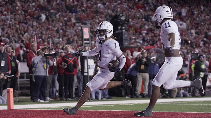 Penn State safety Jaylen Reed (1) returns an interception for a touchdown against the Wisconsin Badgers during the third quarter at Camp Randall Stadium. Penn State safety Jaylen Reed (1) returns an interception for a touchdown against the Wisconsin Badgers during the third quarter at Camp Randall Stadium.