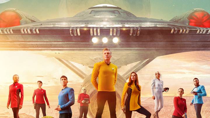 Pictured: (L-R) Celia Rose Gooding as Uhura, Melissa Navia as Ortegas, Ethan Peck as Spock, Bruce Horak as Hemmer, Anson Mount as Pike, Rebecca Romijn as Una, Jess Bush as Chapel, Christina Chong as La’an and Baby Olusanmokun as M’Benga in the official key art of the Paramount+ original series STAR TREK: STRANGE NEW WORLDS. Photo Cr: James Dimmock/Paramount+ ©2022 ViacomCBS. All Rights Reserved.