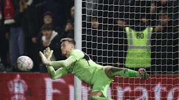 Josh Keeley makes the all important penalty save against Derby County