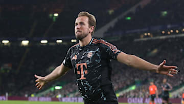 Bayern Munich forward Harry Kane celebrates after scoring against Celtic.