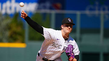 Sep 29, 2024; Denver, Colorado, USA; Colorado Rockies starting pitcher Ryan Feltner (18) delivers a pitch in the first inning against the Los Angeles Dodgers at Coors Field. Mandatory Credit: Ron Chenoy-Imagn Images