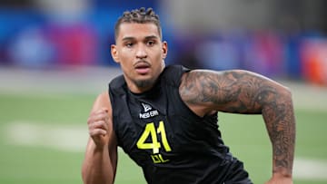 Miami defensive lineman Tyler Baron (DL41) participates in drills during the 2025 NFL Combine at Lucas Oil Stadium. 