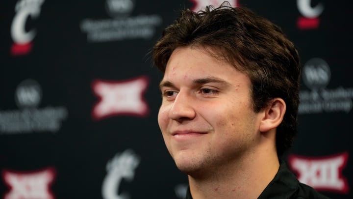 New transfer quarterback Brendan Sorsby takes questions during a press conference at the University of Cincinnati   s Fifth Third Arena in Cincinnati on Tuesday, Feb. 13, 2024.