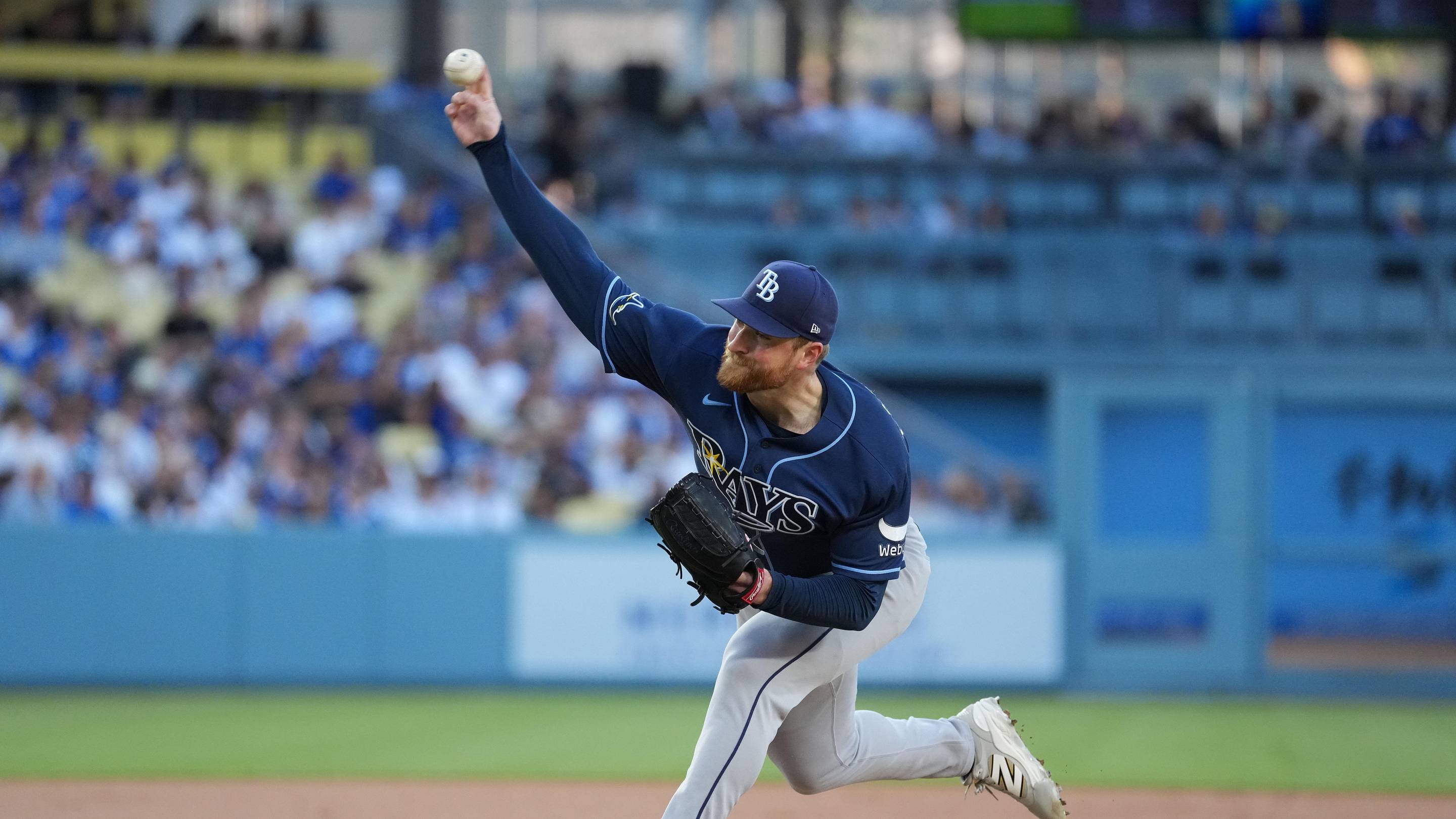 Jun 16, 2026; Los Angeles, California, USA; Tampa Bay Rays starting pitcher Drew Rasmussen (57) throws during the first inning against the Los Angeles Dodgers at Dodger Stadium. Mandatory Credit: Kirby Lee-Imagn Images