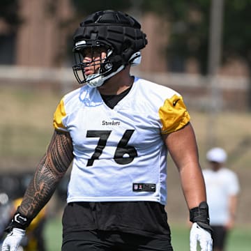 Jul 28, 2024; Latrobe, PA, USA; Pittsburgh Steelers offensive tackle Troy Fautanu (76) participates in drills during training camp at Saint Vincent College. Mandatory Credit: Barry Reeger-Imagn Images