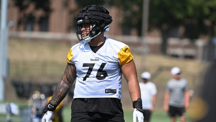 Jul 28, 2024; Latrobe, PA, USA; Pittsburgh Steelers offensive tackle Troy Fautanu (76) participates in drills during training camp at Saint Vincent College. Mandatory Credit: Barry Reeger-USA TODAY Sports