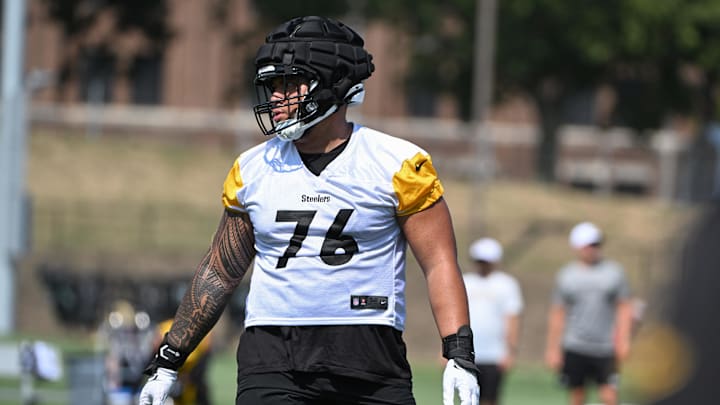 Jul 28, 2024; Latrobe, PA, USA; Pittsburgh Steelers offensive tackle Troy Fautanu (76) participates in drills during training camp at Saint Vincent College. Mandatory Credit: Barry Reeger-Imagn Images