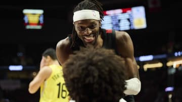 Nov 22, 2023; Portland, Oregon, USA; Portland Trail Blazers forward Jerami Grant (9) picks up guard Matisse Thybulle (4) after he was fouled bypassed Utah Jazz forward Simone Fontecchio (16) during the second half at Moda Center. Mandatory Credit: Troy Wayrynen-USA TODAY Sports