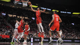 Dec 8, 2023; Portland, Oregon, USA; Portland Trail Blazers shooting guard Shaedon Sharpe (17) grabs a rebound against the Dallas Mavericks.