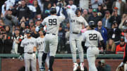 May 31, 2024; San Francisco, California, USA; New York Yankees designated hitter Aaron Judge (99) celebrates with left fielder Alex Verdugo (center right) after hitting a home run against the San Francisco Giants during the third inning at Oracle Park. Mandatory Credit: Darren Yamashita-USA TODAY Sports