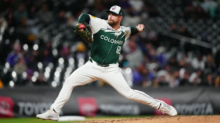 Apr 6, 2024; Denver, Colorado, USA; Colorado Rockies pitcher Jalen Beeks (68) delivers a pitch in the eighth inning against the Tampa Bay Rays at Coors Field. Mandatory Credit: Ron Chenoy-Imagn Images