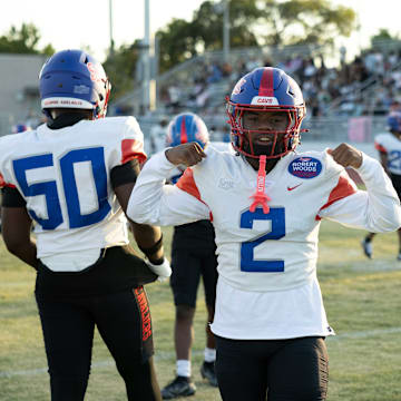 Gardena Serra's Devohn Moutra Jr. flexes for the camera before the Cavs take on Hamilton High.