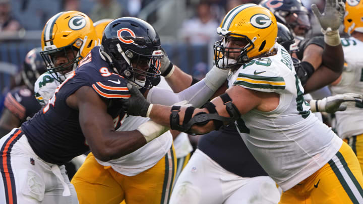 Sep 10, 2023; Chicago, Illinois, USA; Green Bay Packers offensive tackle David Bakhtiari (69) blocks Chicago Bears defensive end Rasheem Green (94) during the fourth quarter of their regular season opening game at Soldier Field. Mandatory Credit: Mark Hoffman-USA TODAY Sports