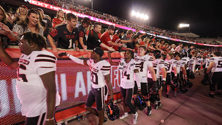 Oct 4, 2025; Houston, Texas, USA; Texas Tech Red Raiders celebrate with fans after defeating the Houston Cougars at TDECU Stadium. Mandatory Credit: Thomas Shea-Imagn Images
