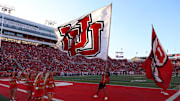 The Utah Utes cheer team celebrate a touchdown against the Cal Poly Mustangs during the second half at Rice-Eccles Stadium.