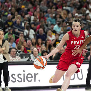 Caitlin Clark (left) and A'ja Wilson (right) have contributed to the WNBA's popularity explosion.