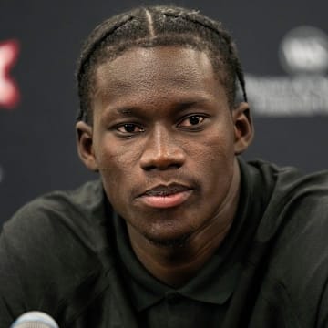 Sophomore center Moustapha Thiam speaks during a press conference at the University of Cincinnati on Tuesday, Sept. 16, 2025.