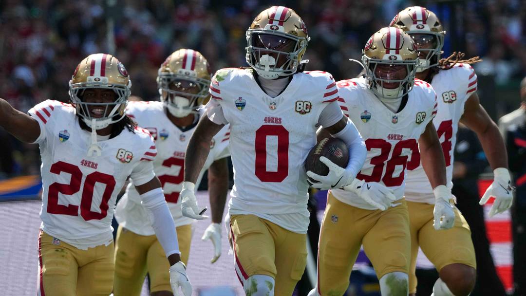 San Francisco 49ers cornerback Renardo Green (0) celebrates with cornerback Upton Stout (20) and safety Marques Sigle (36) after intercepting a pass against the Los Angeles Rams during the 2026 NFL Melbourne Game at Melbourne Cricket Ground. San Francisco 49ers cornerback Renardo Green (0) celebrates with cornerback Upton Stout (20) and safety Marques Sigle (36) after intercepting a pass against the Los Angeles Rams during the 2026 NFL Melbourne Game at Melbourne Cricket Ground.
