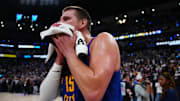 May 9, 2025; Denver, Colorado, USA; Denver Nuggets center Nikola Jokic (15) following the overtime win against the Oklahoma City Thunder during game three of the second round for the 2025 NBA Playoffs at Ball Arena. Mandatory Credit: Ron Chenoy-Imagn Images