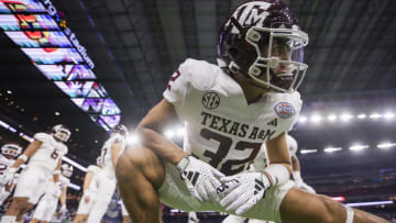 Dec 27, 2023; Houston, TX, USA; Texas A&M Aggies defensive back Aaron Trevino (32) stretches