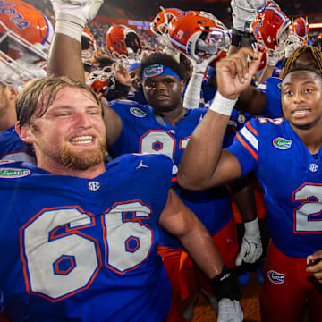 Florida Gators quarterback DJ Lagway (2) celebrates with teammates at Ben Hill Griffin Stadium