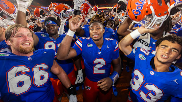 Florida Gators quarterback DJ Lagway (2) celebrates with teammates at Ben Hill Griffin Stadium