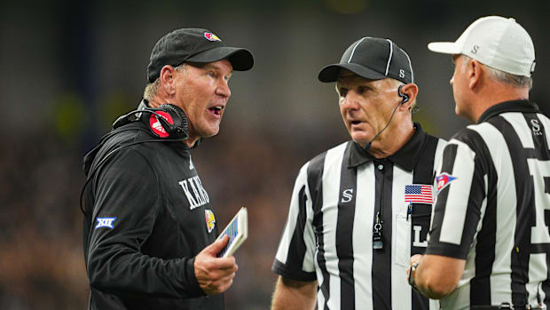 Sep 13, 2024; Kansas City, Kansas, USA; Kansas Jayhawks head coach Lance Leipold talks to officials during the second half ag