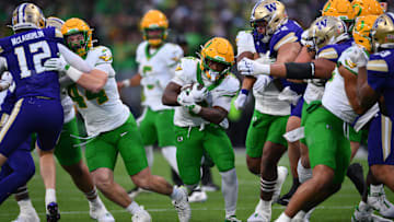 Oregon's o-line cleared the way for a conference-leading 5.8 yards a carry this season, 218 yards a game, while allowing just 14 sacks in 12 games. Yesterday the received some individual recognition.