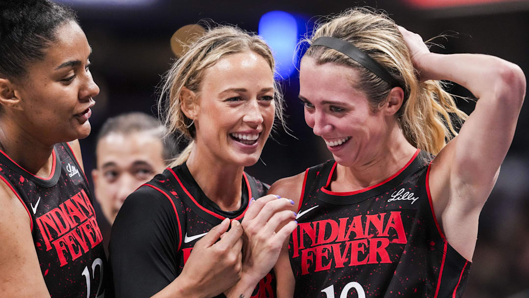 Aug 9, 2025; Indianapolis, IN, USA; Indiana Fever forward Damiris Dantas (12), Indiana Fever guard Sophie Cunningham (8) and Indiana Fever guard Lexie Hull (10) huddle up Saturday, Aug. 9, 2025, during a game between the Indiana Fever and the Chicago Sky at Gainbridge Fieldhouse in Indianapolis.  Mandatory Credit: Grace Smith/USA TODAY Network via Imagn Images 