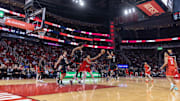 Jan 24, 2024; Houston, Texas, USA;  Portland Trail Blazers guard Scoot Henderson (00) and Houston Rockets guard Fred VanVleet (5) reach for a rebound in the fourth quarter at Toyota Center. Mandatory Credit: Thomas Shea-Imagn Images