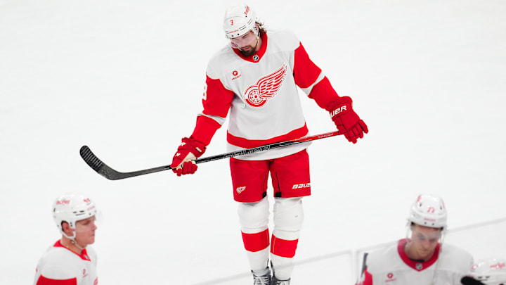 Mar 22, 2025; Las Vegas, Nevada, USA; Detroit Red Wings defenseman Justin Holl (3) reacts after the Red Wings were defeated by the Vegas Golden Knights 6-3 at T-Mobile Arena. Mandatory Credit: Stephen R. Sylvanie-Imagn Images