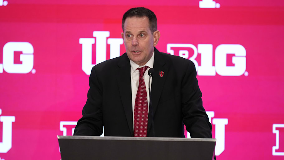 Curt CIgnetti addresses reporters at the Big Ten's media days in Las Vegas. | Lucas Peltier-Imagn Images