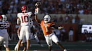 Nov 22, 2025; Austin, Texas, USA; Texas Longhorns defensive lineman Colin Simmons (1) rushes Arkansas Razorbacks quarterback Taylen Green (10) during the first half at Darrell K Royal-Texas Memorial Stadium. Mandatory Credit: Scott Wachter-Imagn Images