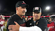 Sep 13, 2025; Stanford, California, USA; Stanford Cardinal head coach Frank Reich (left) and Boston College Eagles head coach Bill O'Brien (right) greet each other after the game at Stanford Stadium. Mandatory Credit: Darren Yamashita-Imagn Images