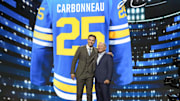 Jun 27, 2025; Los Angeles, California, USA; Justin Carbonneau is selected as the 19th overall pick to the St. Louis Blues in the first round of the 2025 NHL Draft at Peacock Theater. Mandatory Credit: Kirby Lee-Imagn Images