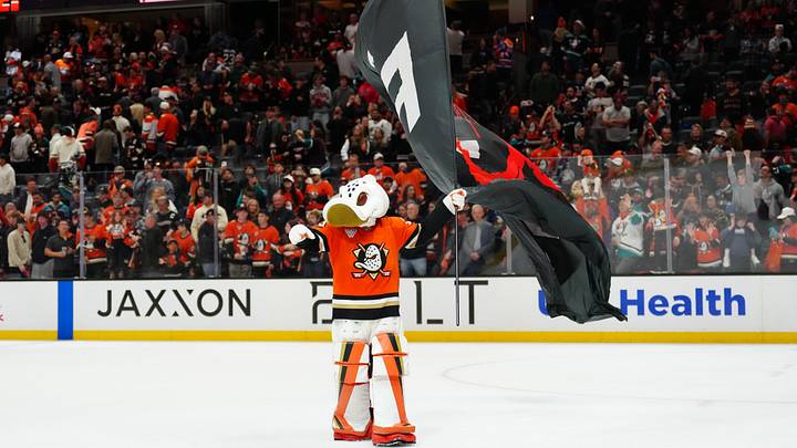 Apr 30, 2026; Anaheim, California, USA; Anaheim Ducks mascot Wild Wing waves a flag after game six of the first round of the 2026 Stanley Cup Playoffs against the Edmonton Oilers at Honda Center. Mandatory Credit: Kirby Lee-Imagn Images